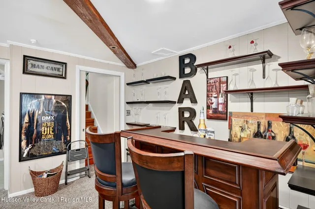 a view of a chairs and table in the patio