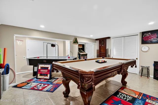 a view of a house with backyard porch and sitting area