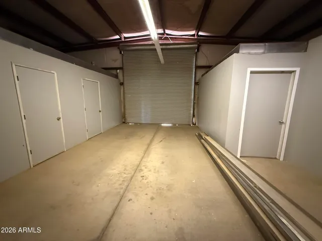 a bathroom with a sink toilet and a mirror