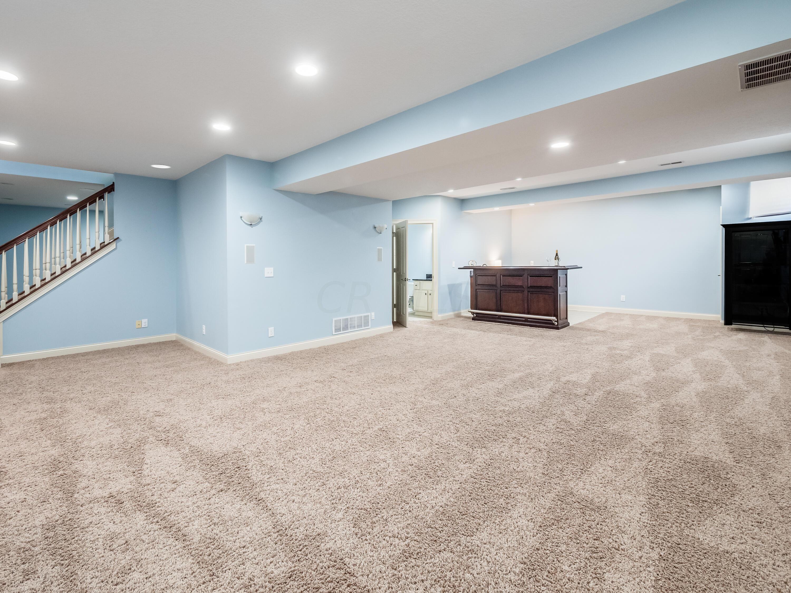 5949 Dunheath Loop Dublin, OH 43016 - Photo 43 of 57 Lower Level with wet bar!