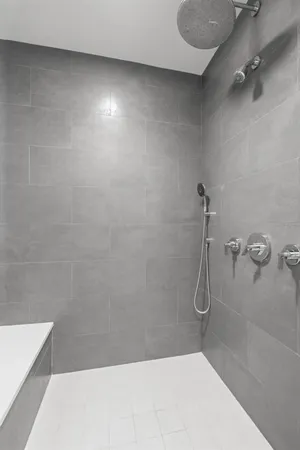 a kitchen with stainless steel appliances cabinets and a window