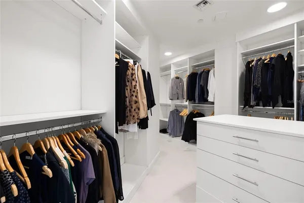 a view of an empty walk in closet
