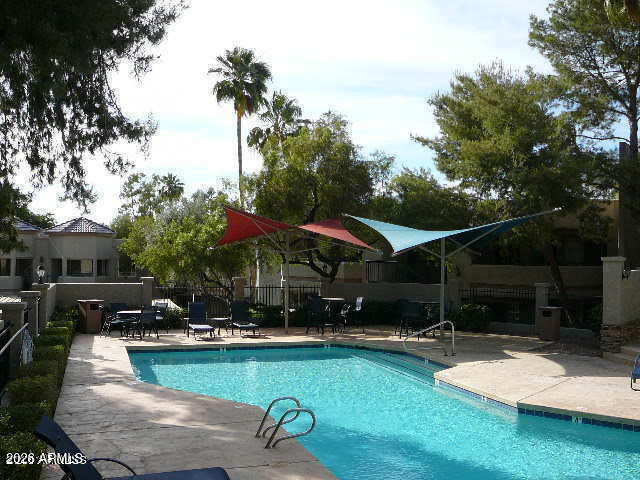 1720 East Thunderbird Road, Unit 2100 Phoenix, AZ 85022 - Photo 7 of 9 a view of a swimming pool with a patio
