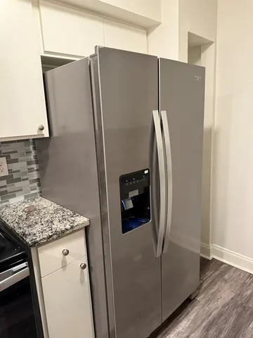 a close view of a refrigerator and microwave