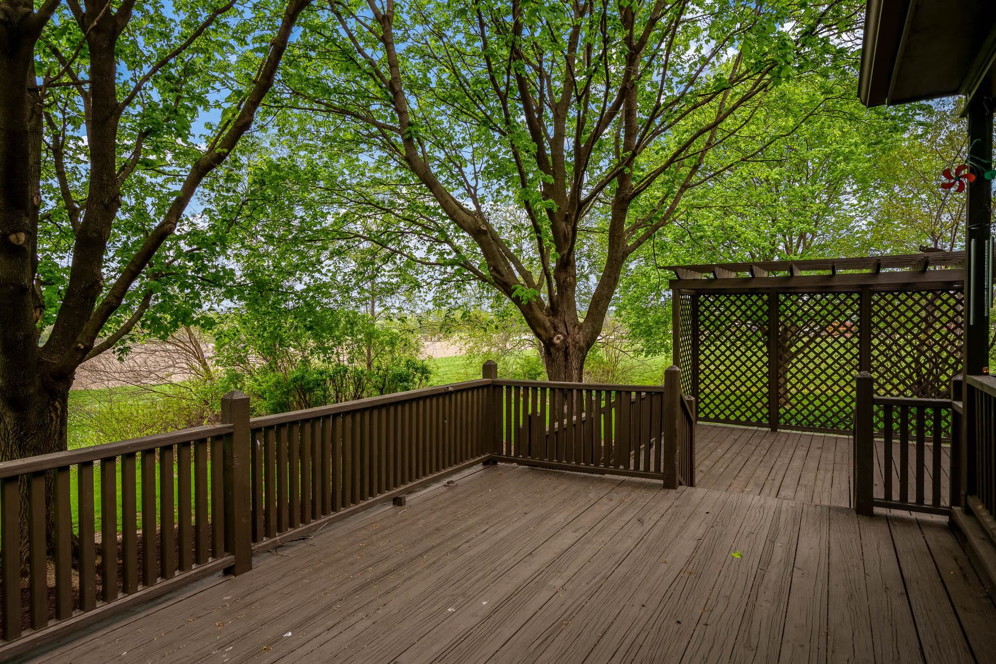 10562 Town Hall Road Belvidere, IL 61008 - Photo 26 of 72 a view of deck with wooden floor and outdoor seating