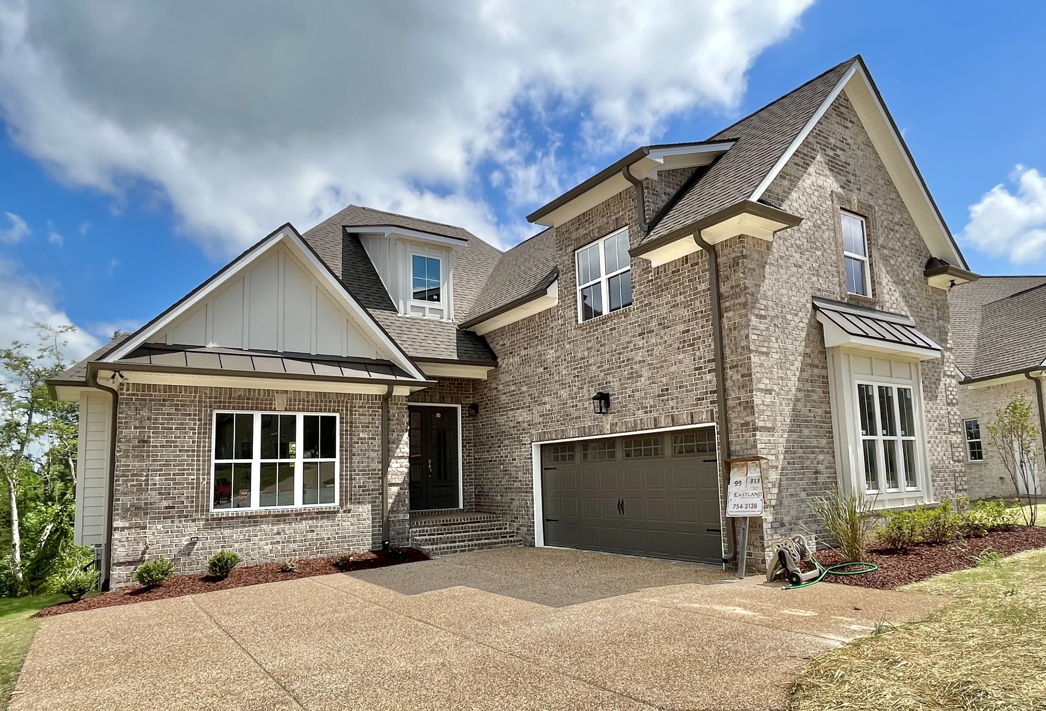 813 Ridgestone Place, Unit 99 Lebanon, TN 37087 - Photo 1 of 24 a front view of a house with a yard