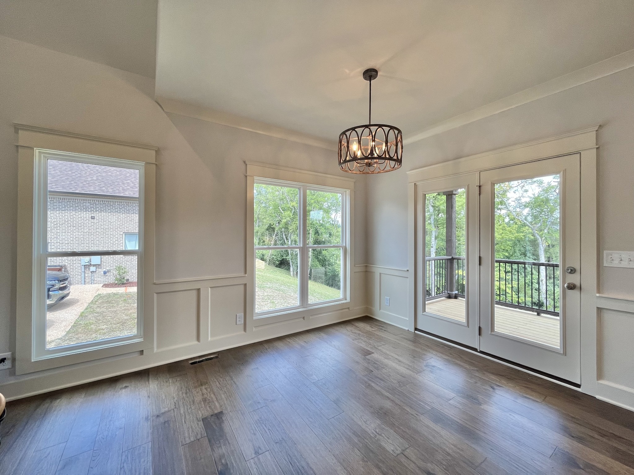 813 Ridgestone Place, Unit 99 Lebanon, TN 37087 - Photo 14 of 24 a view of an empty room with wooden floor and a window