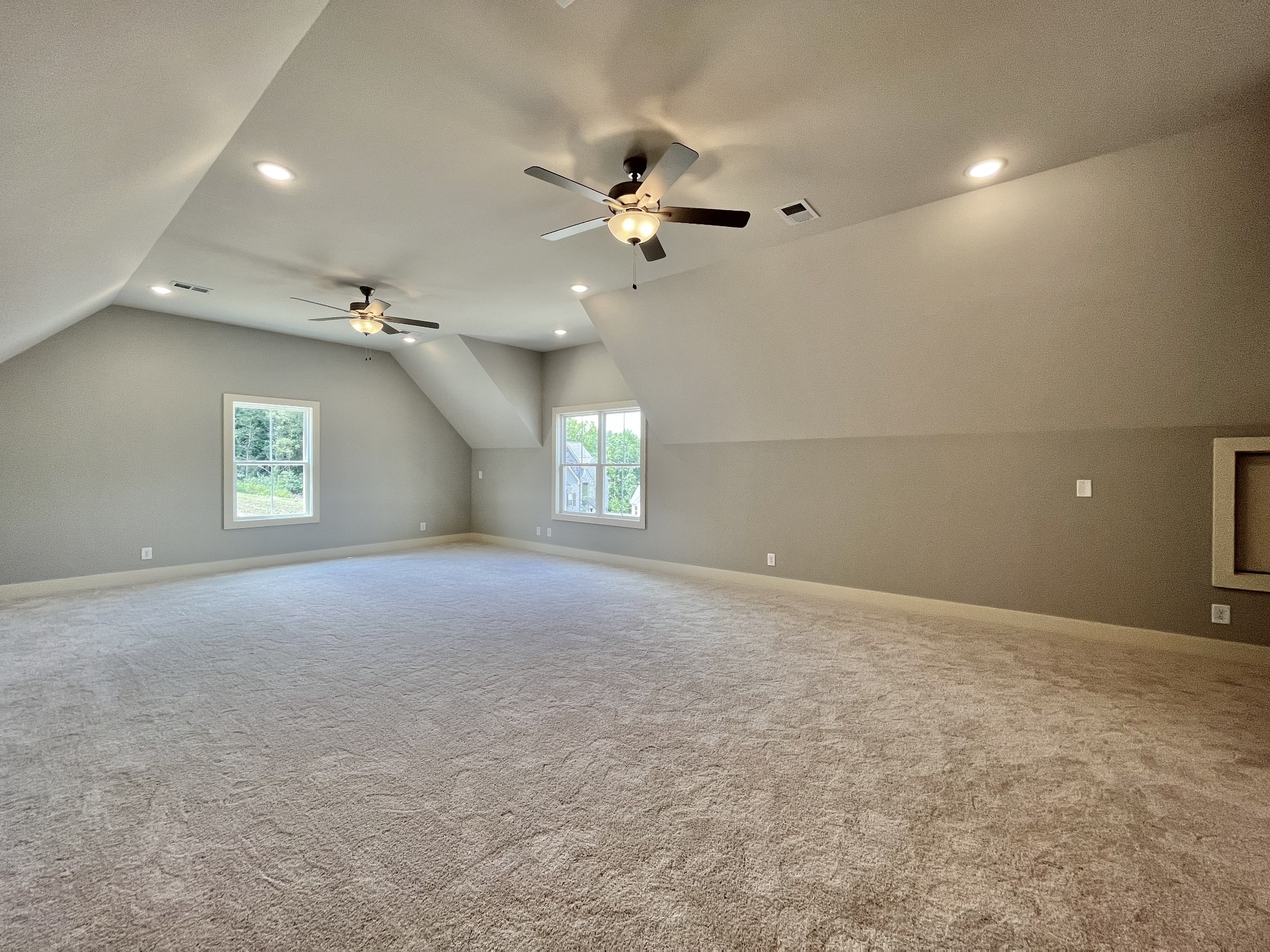 813 Ridgestone Place, Unit 99 Lebanon, TN 37087 - Photo 20 of 24 en empty room with windows and ceiling fan