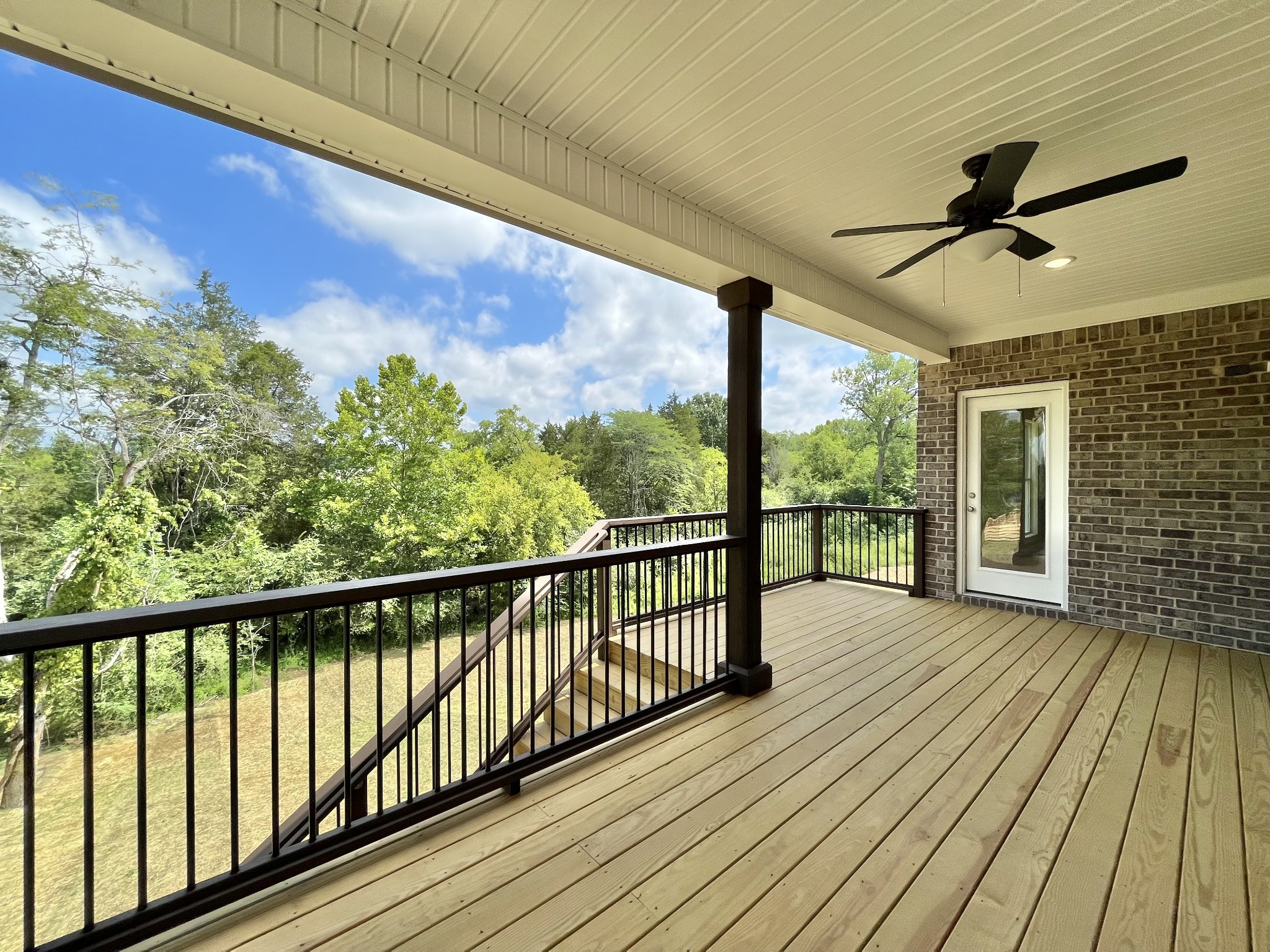 813 Ridgestone Place, Unit 99 Lebanon, TN 37087 - Photo 24 of 24 a view of a balcony with wooden floor