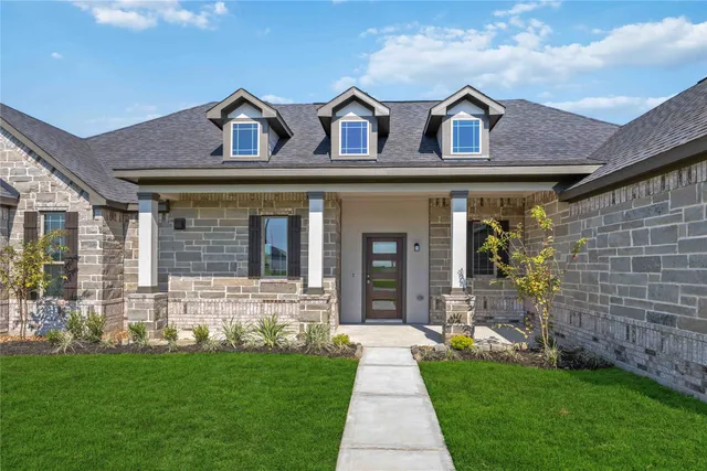 a view of a swimming pool and an outdoor space