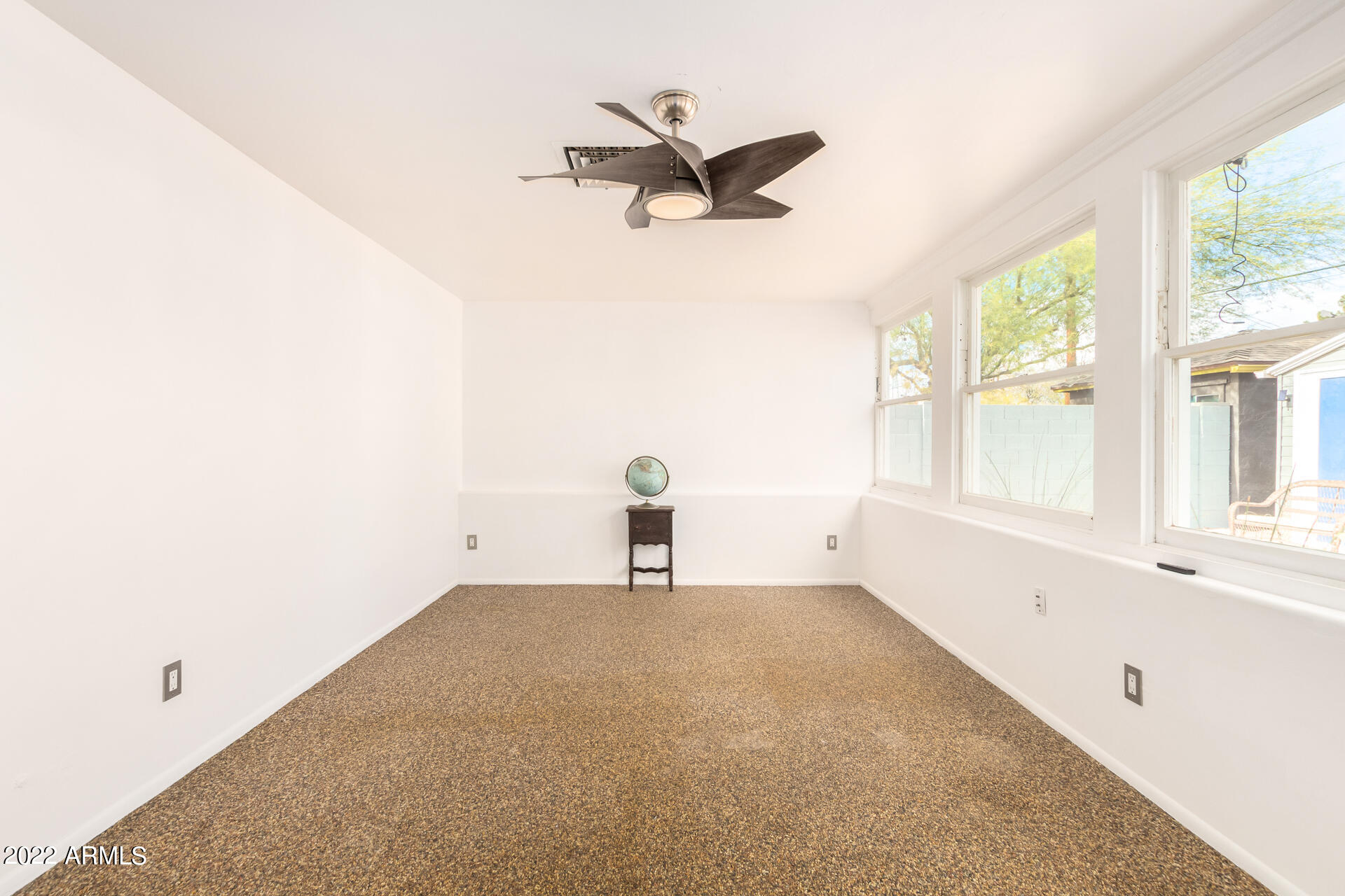 1330 East Granada Road Phoenix, AZ 85006 - Photo 13 of 24 a view of empty room with ceiling fan
