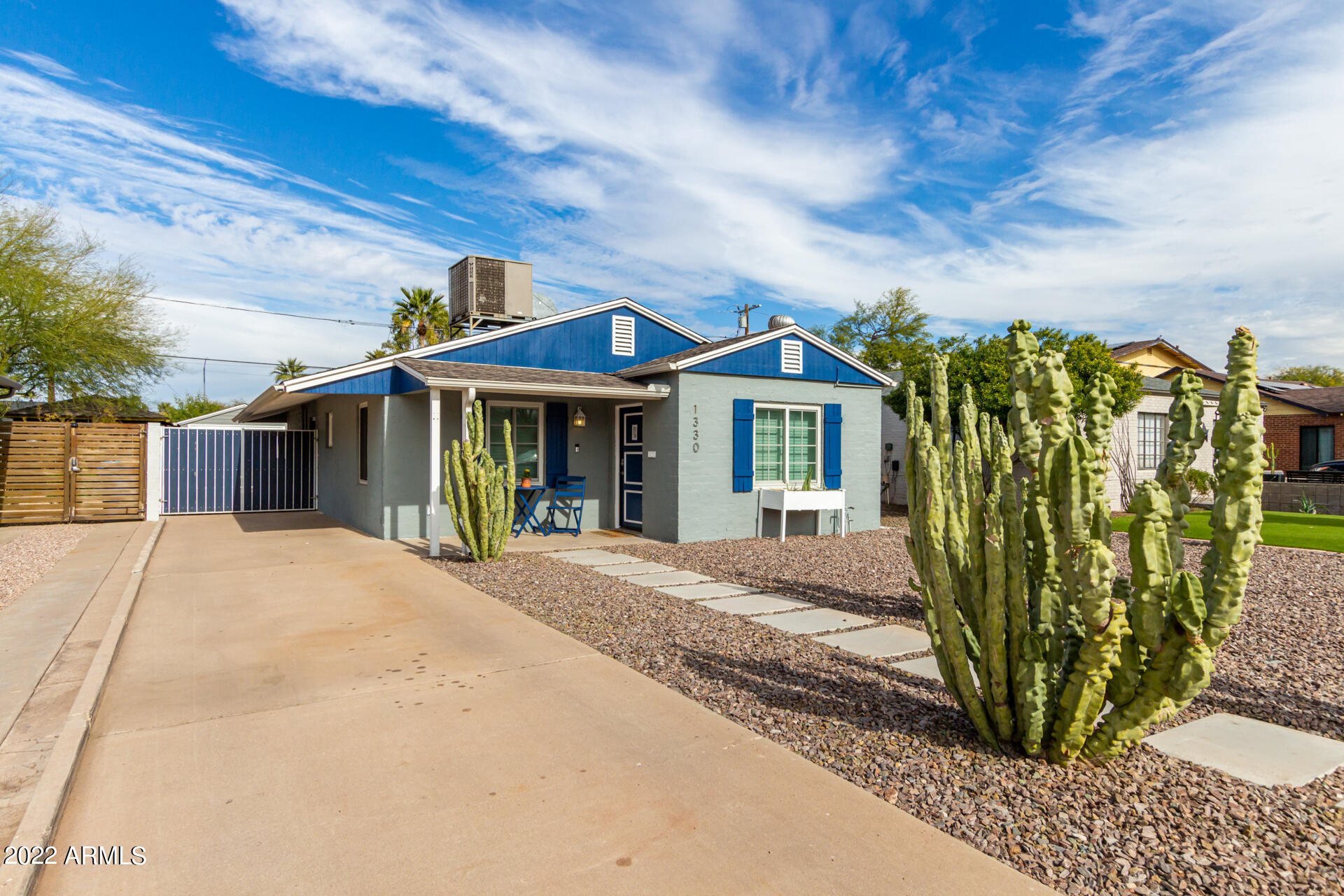 1330 East Granada Road Phoenix, AZ 85006 - Photo 3 of 24 a front view of a house with a yard