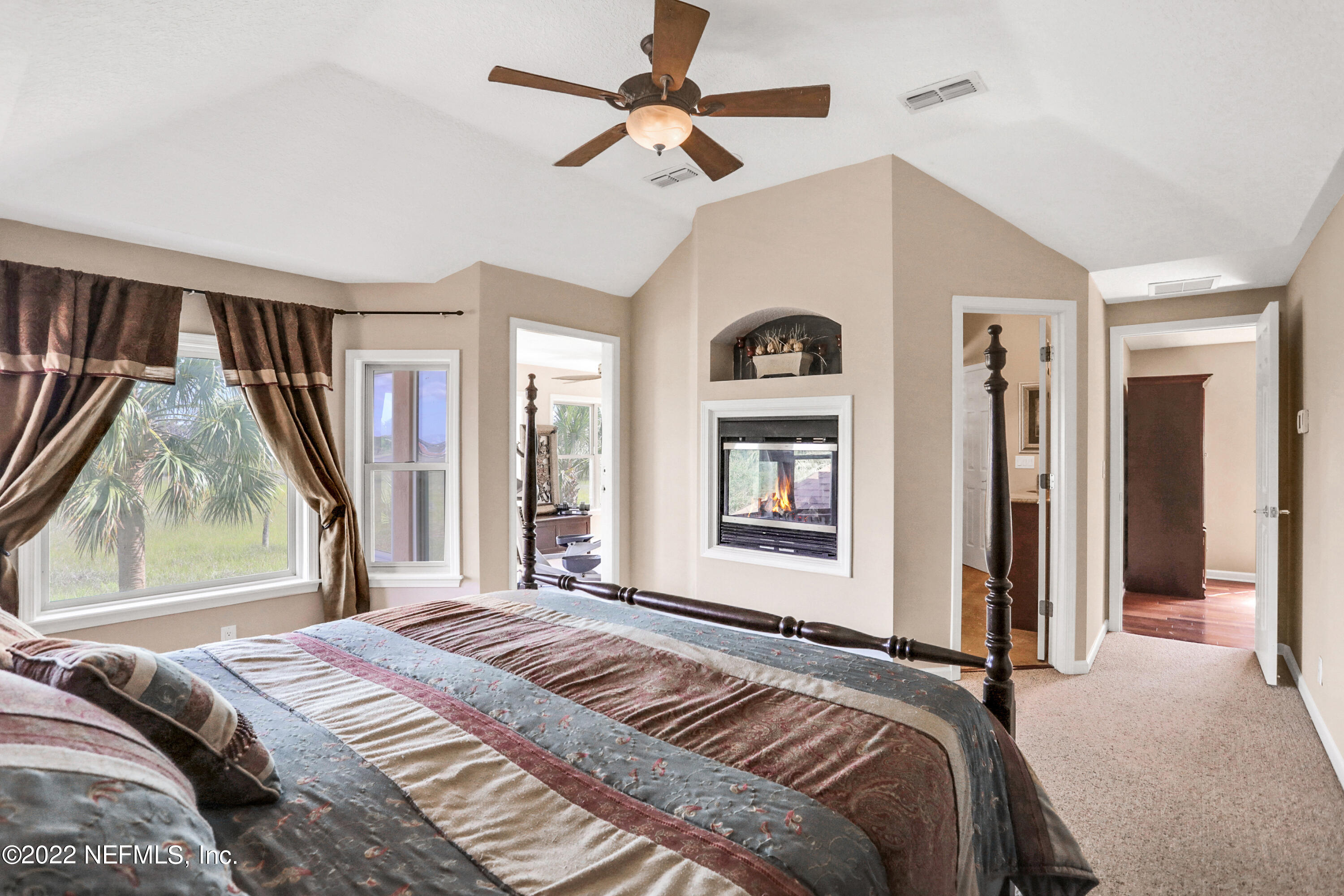 1773 Marshside Drive Jacksonville Beach, FL 32250 - Photo 49 of 66 Primary Suite w/ Fireplace