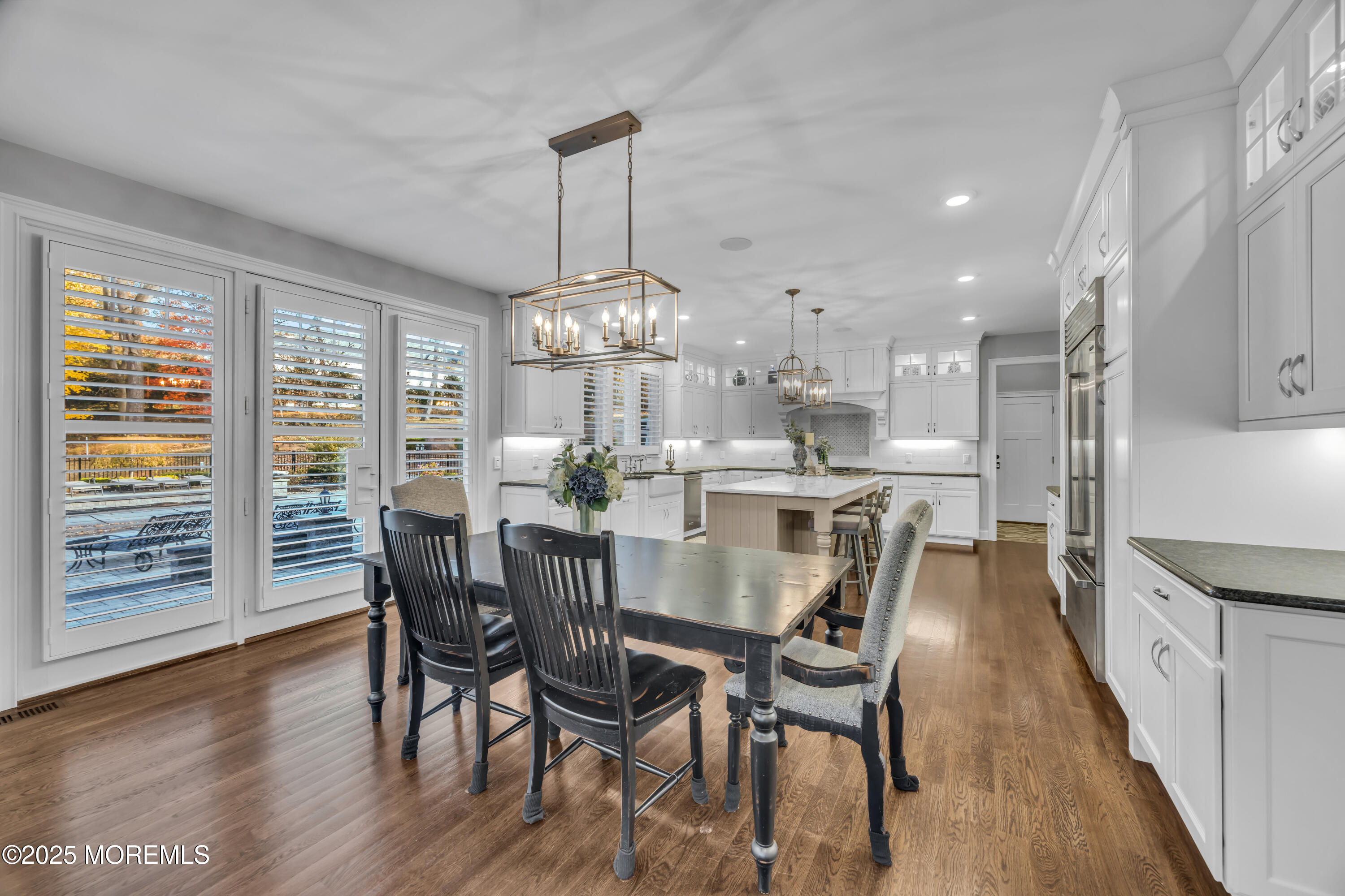 145 Heulitt Road Colts Neck, NJ 07722 - Photo 19 of 59 a view of a dining room with furniture window and wooden floor
