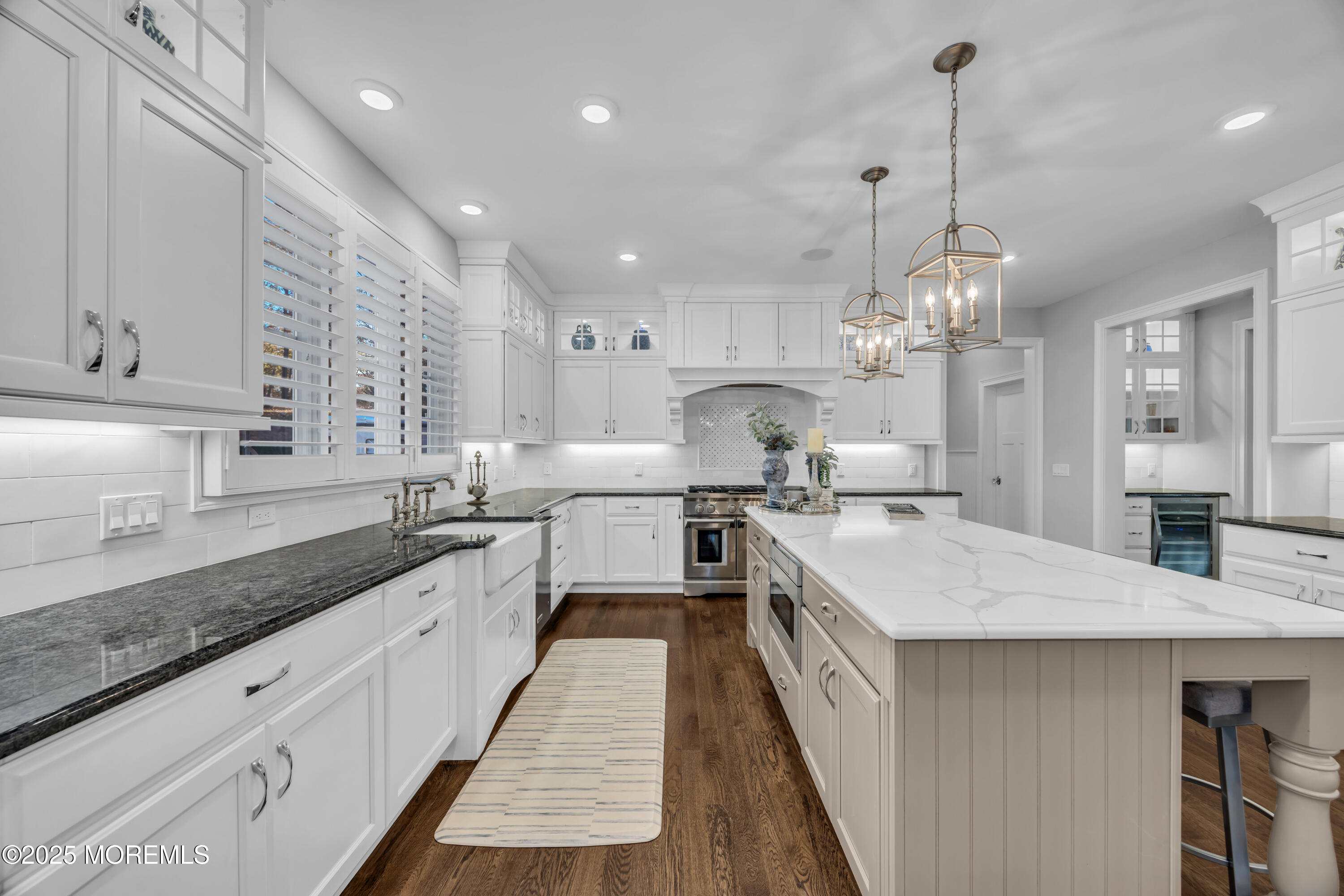 145 Heulitt Road Colts Neck, NJ 07722 - Photo 23 of 59 a large kitchen with kitchen island a sink a counter space and stainless steel appliances