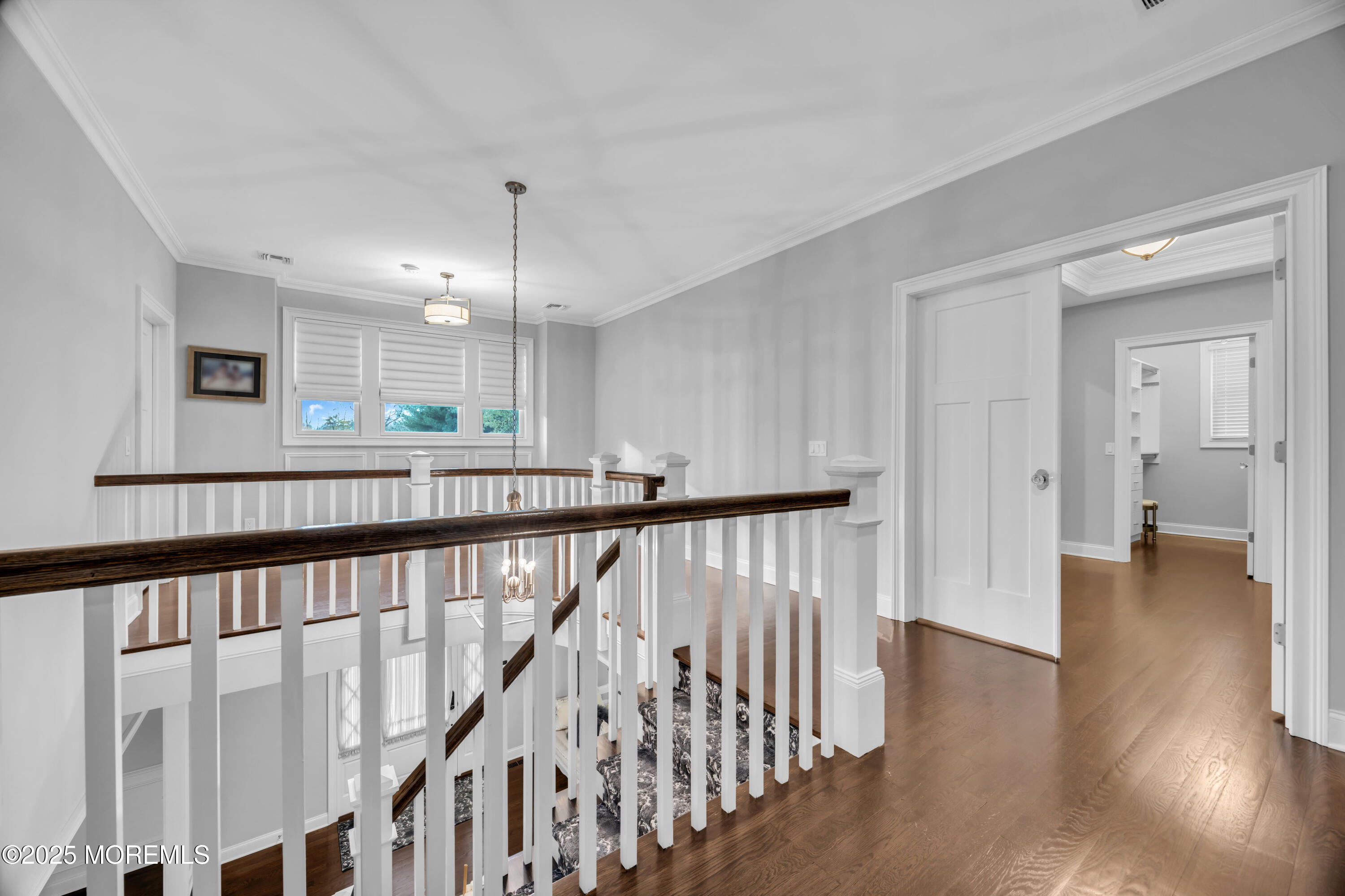 145 Heulitt Road Colts Neck, NJ 07722 - Photo 30 of 59 a view of interior and kitchen with wooden floor