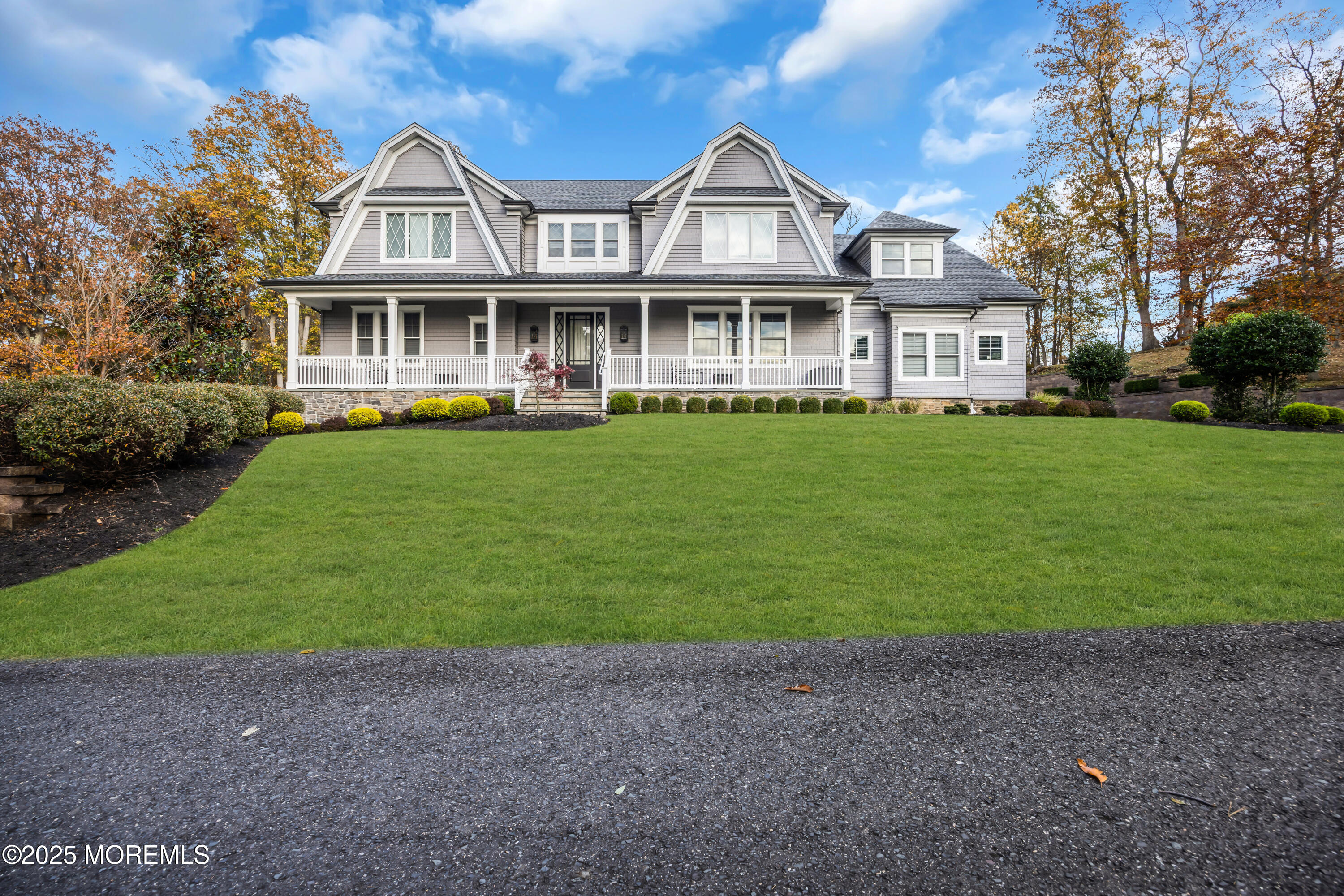 145 Heulitt Road Colts Neck, NJ 07722 - Photo 3 of 59 a front view of a house with a yard