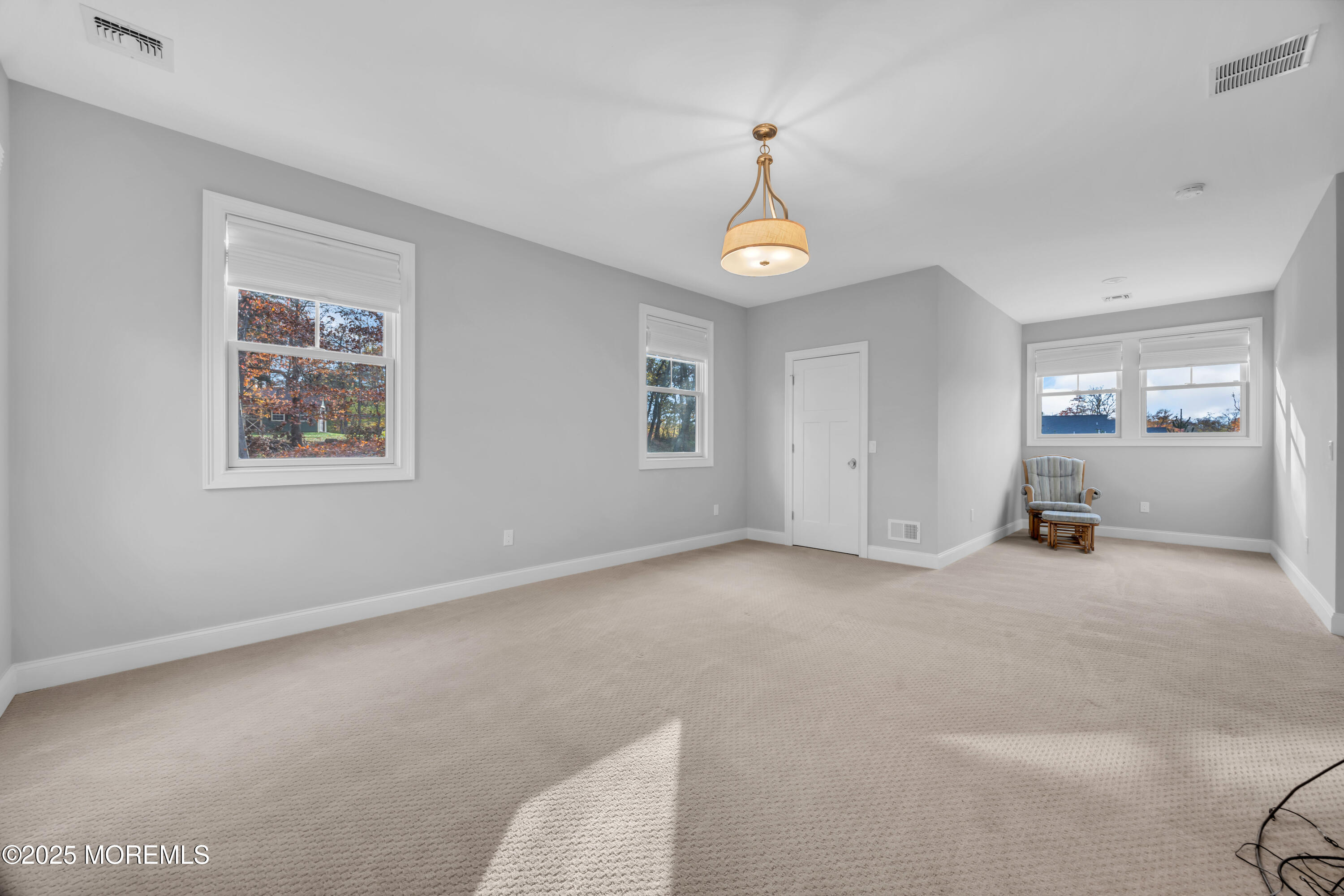 145 Heulitt Road Colts Neck, NJ 07722 - Photo 35 of 59 a view of empty room with windows