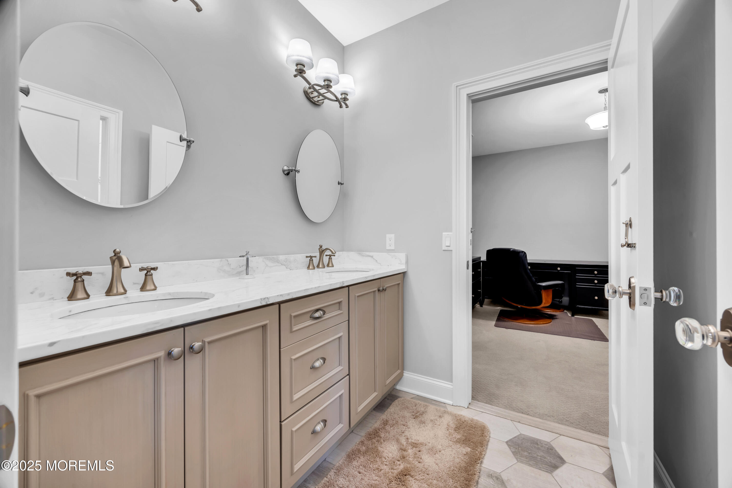 145 Heulitt Road Colts Neck, NJ 07722 - Photo 40 of 59 a en suite bathroom with a double vanity sink double and mirror