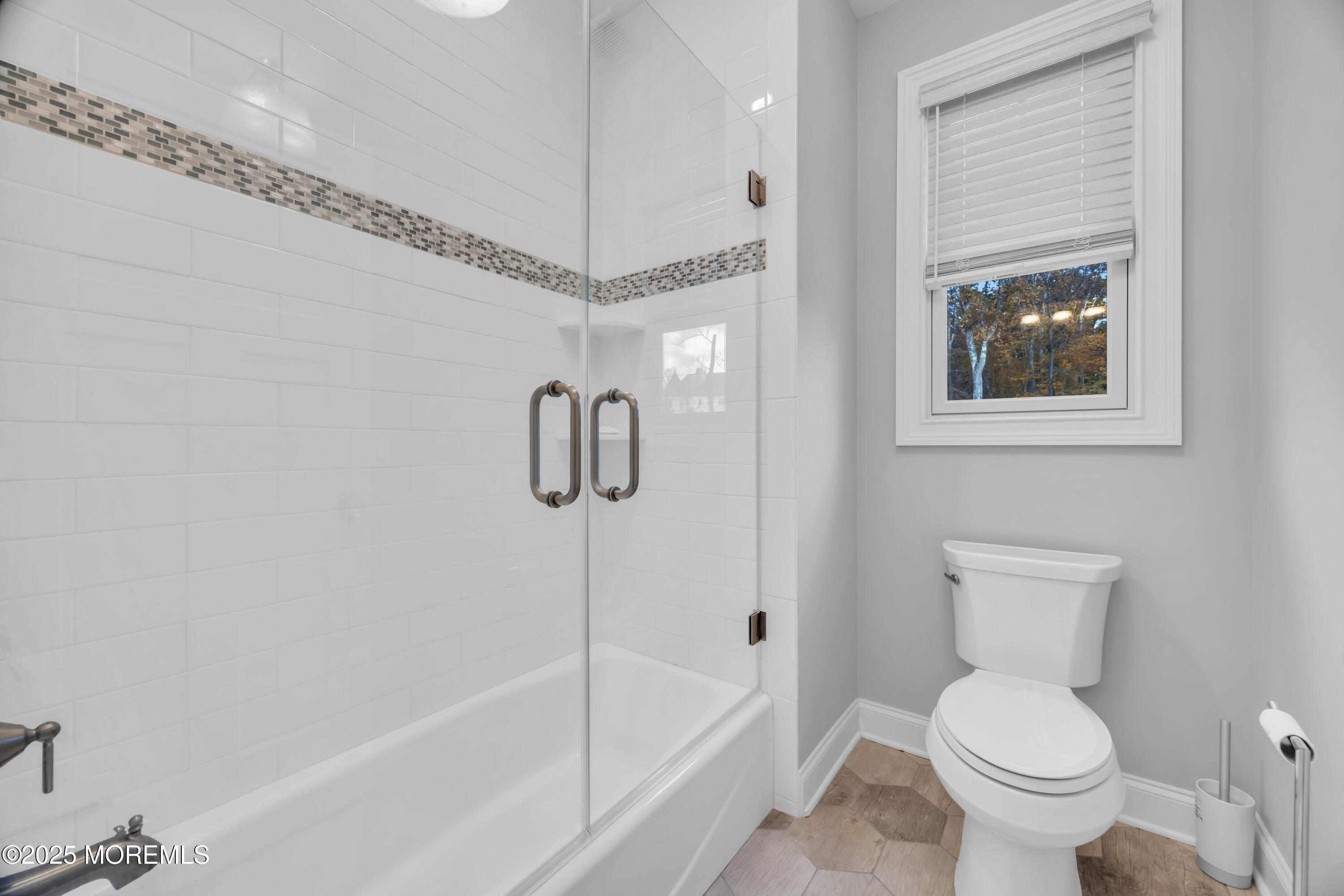 145 Heulitt Road Colts Neck, NJ 07722 - Photo 41 of 59 a bathroom with a toilet a sink and bathtub