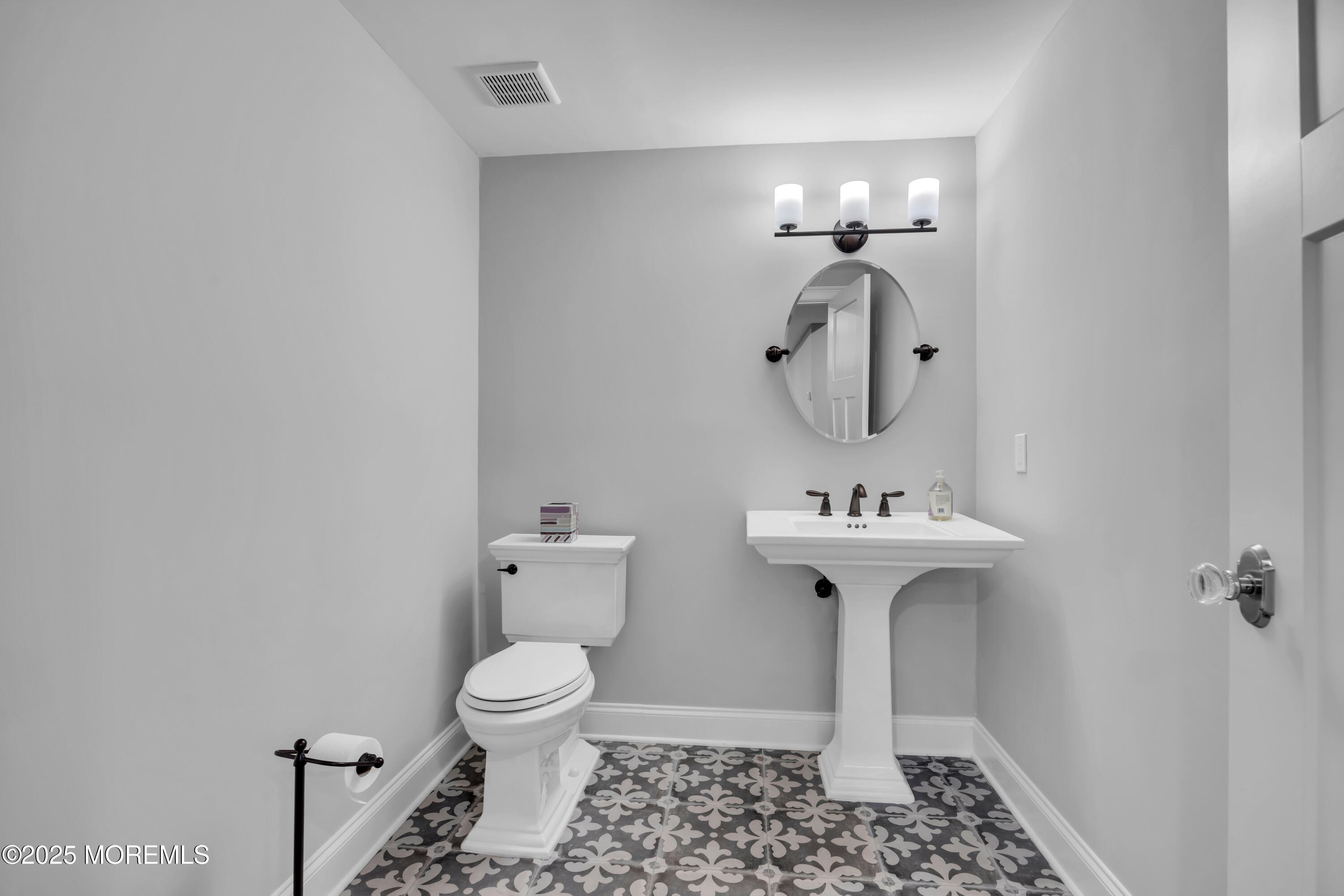 145 Heulitt Road Colts Neck, NJ 07722 - Photo 49 of 59 a bathroom with a sink toilet