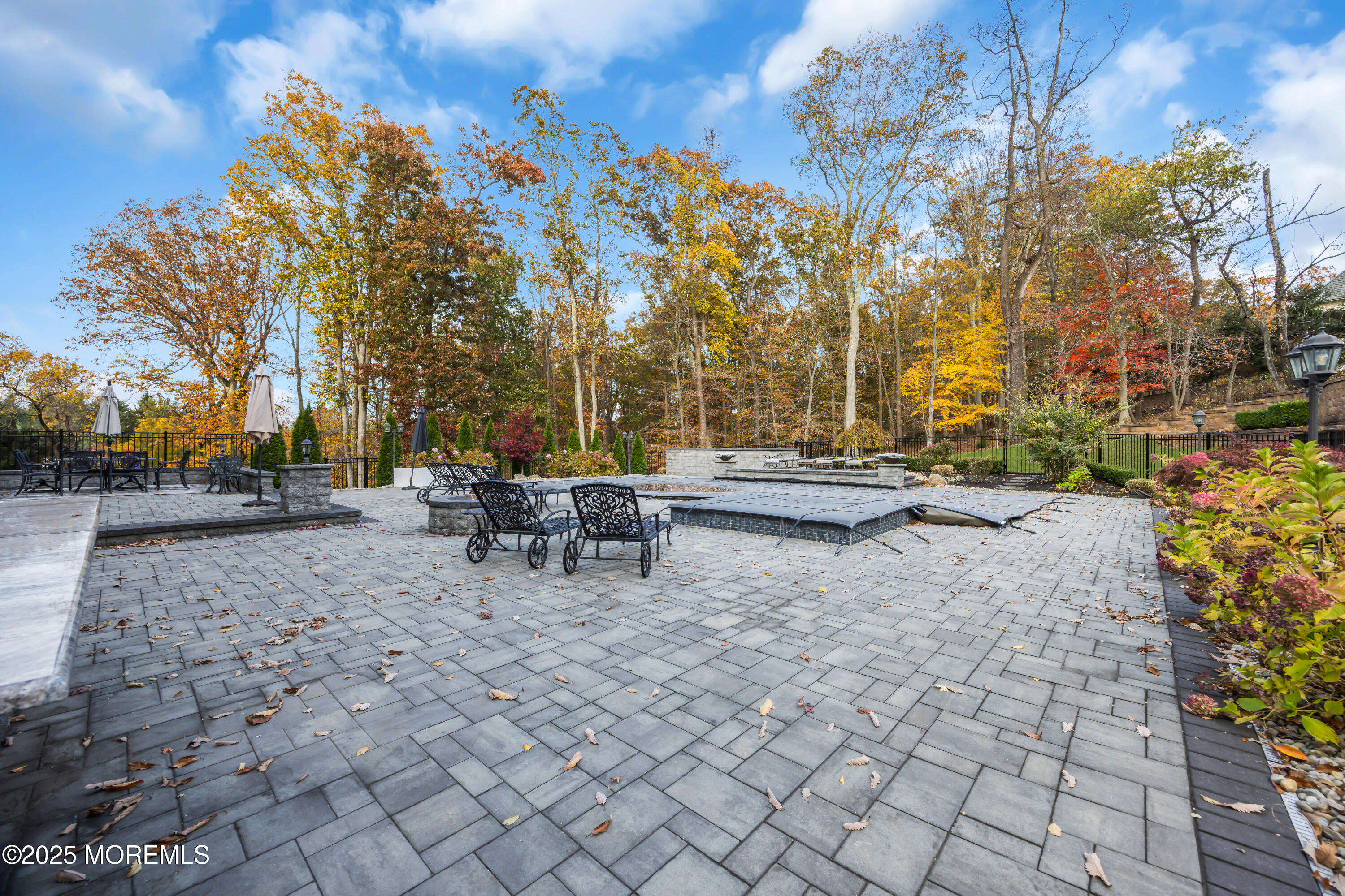 145 Heulitt Road Colts Neck, NJ 07722 - Photo 53 of 59 a view of backyard with sitting area