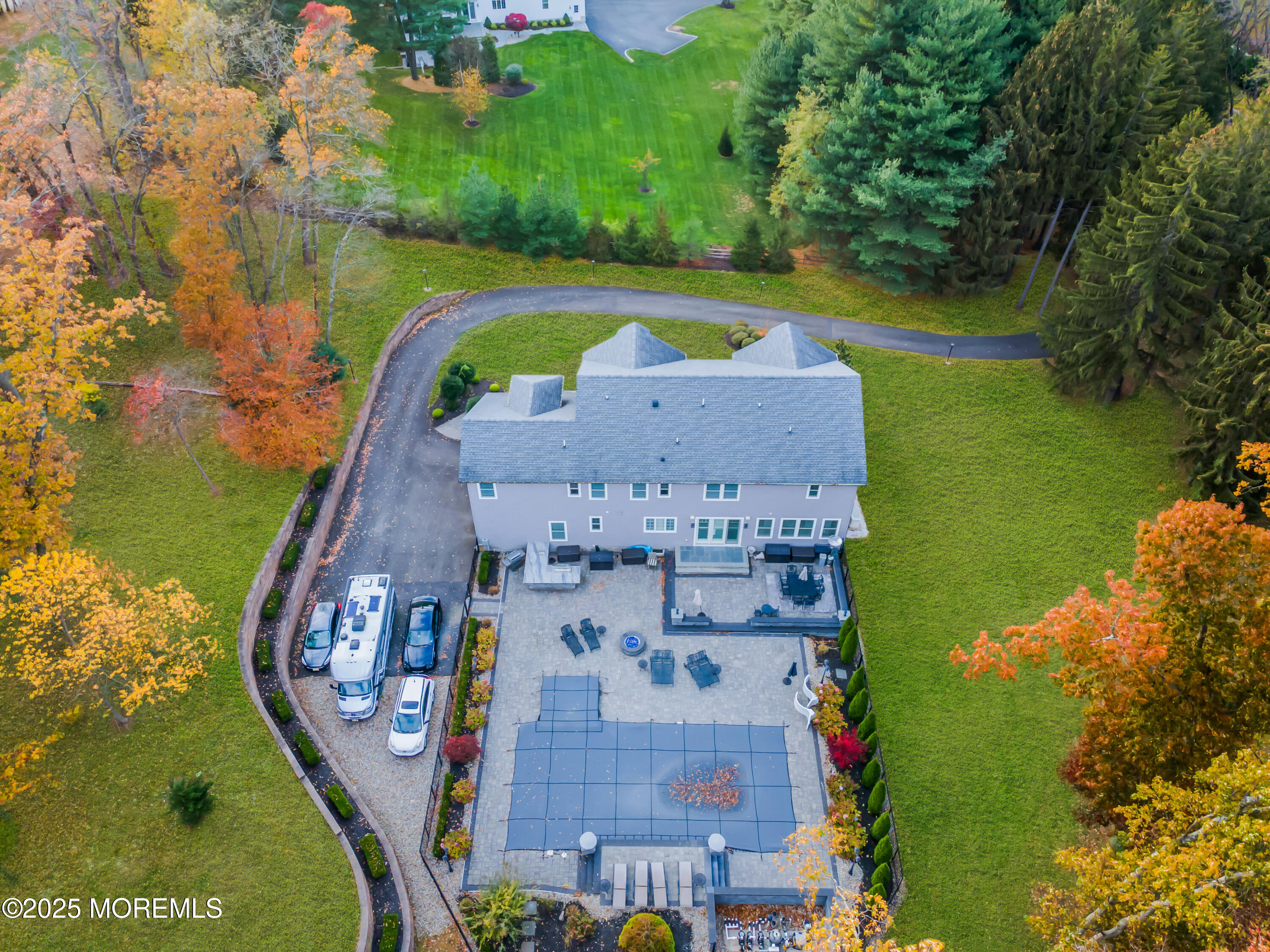 145 Heulitt Road Colts Neck, NJ 07722 - Photo 58 of 59 an aerial view of a house with a lake view