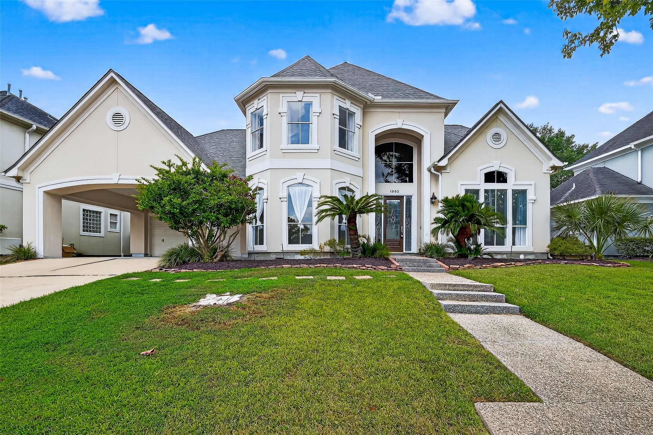 1803 Cottage Landing Lane Houston, TX 77077 - Photo 1 of 50 a front view of a house with a yard