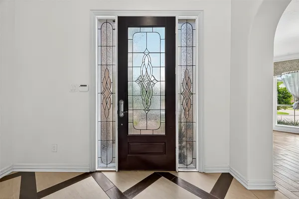 a view of walk in closet with empty room