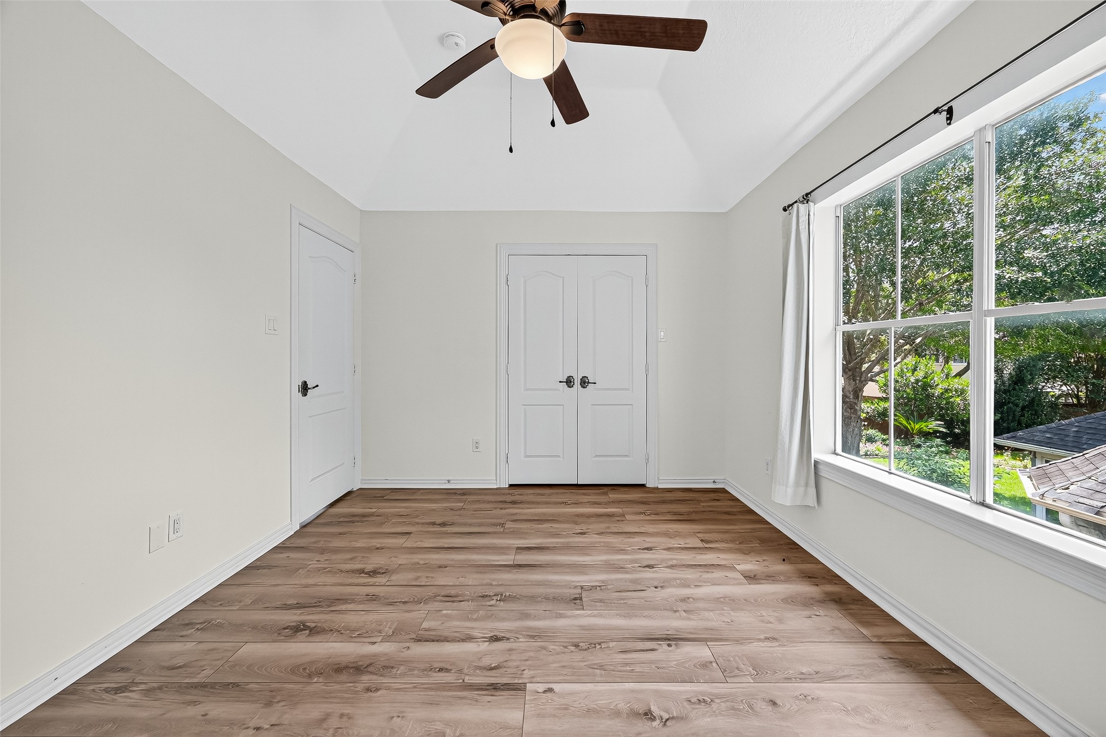 1803 Cottage Landing Lane Houston, TX 77077 - Photo 37 of 50 a view of an empty room with a window