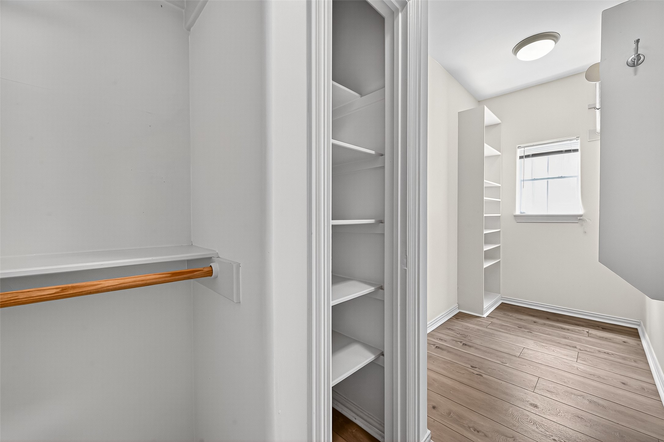 1803 Cottage Landing Lane Houston, TX 77077 - Photo 46 of 50 an empty room with wooden floor and closet