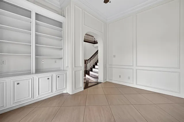a view of an empty room with a fireplace