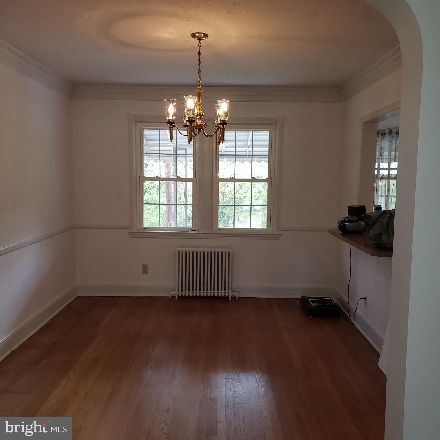 342 Westshire Road Baltimore, MD 21229 - Photo 6 of 23 Dining Room w/Chair Rail and Crown Moulding