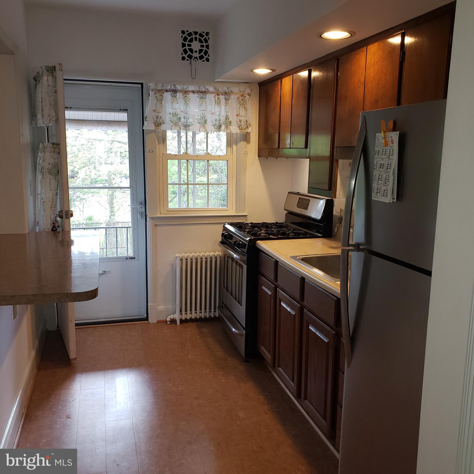 342 Westshire Road Baltimore, MD 21229 - Photo 10 of 23 Kitchen with Light and Stainless Appliances