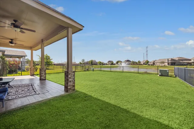 a view of a house with a big yard