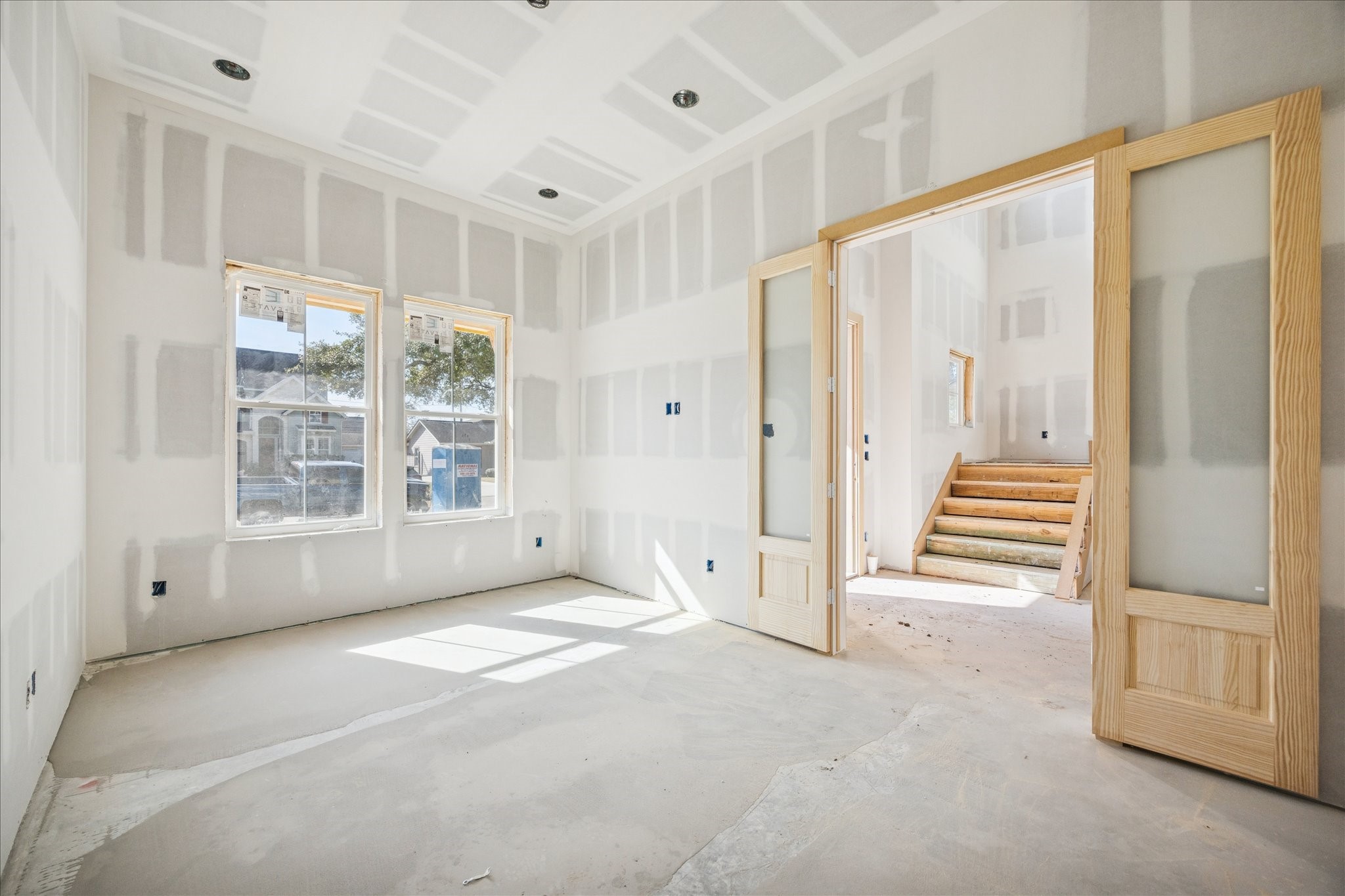 1714 Hewitt Drive Houston, TX 77018 - Photo 3 of 37 a view of an empty room with a window
