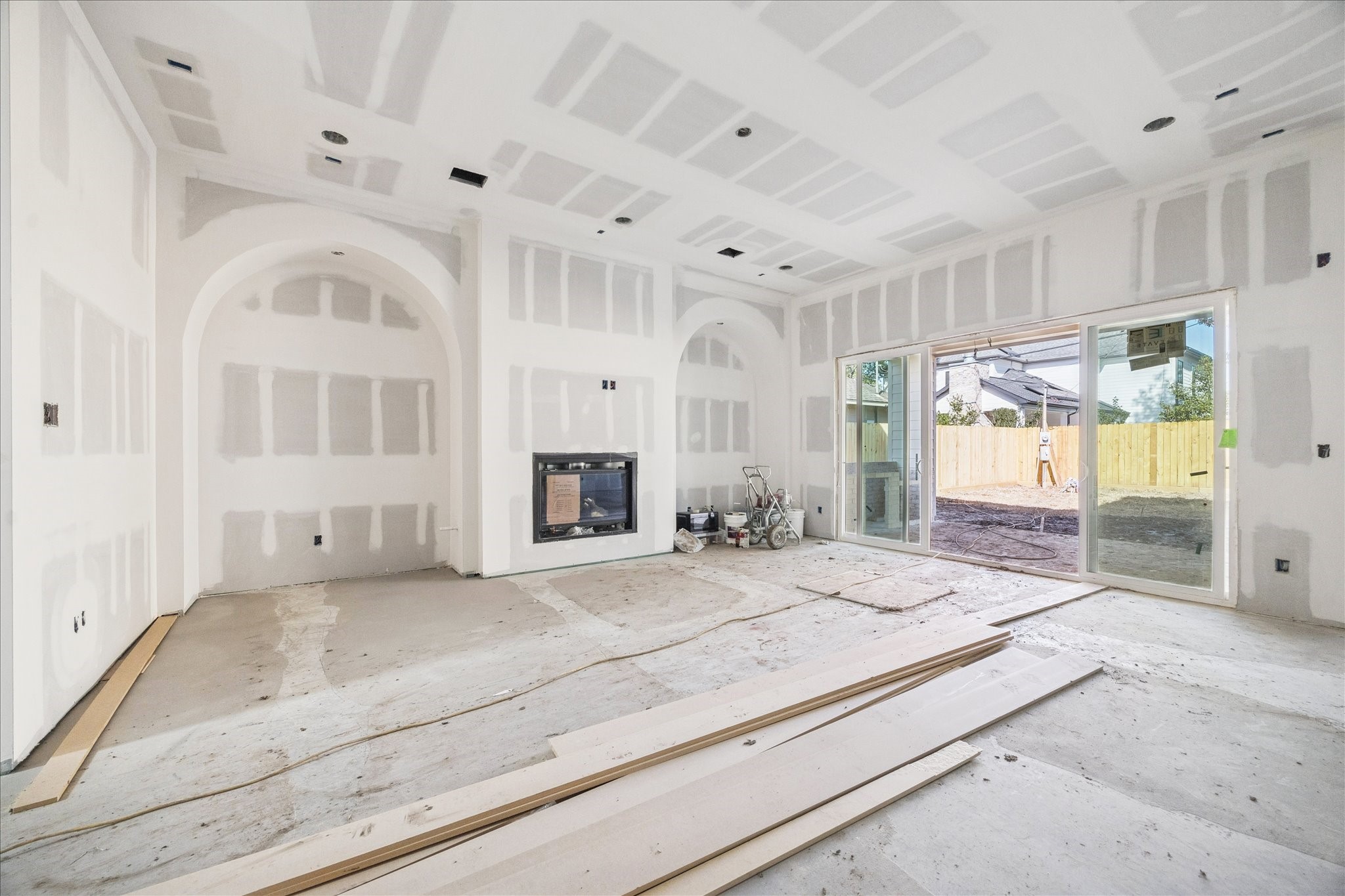 1714 Hewitt Drive Houston, TX 77018 - Photo 4 of 37 a living room with a fireplace furniture and a large window