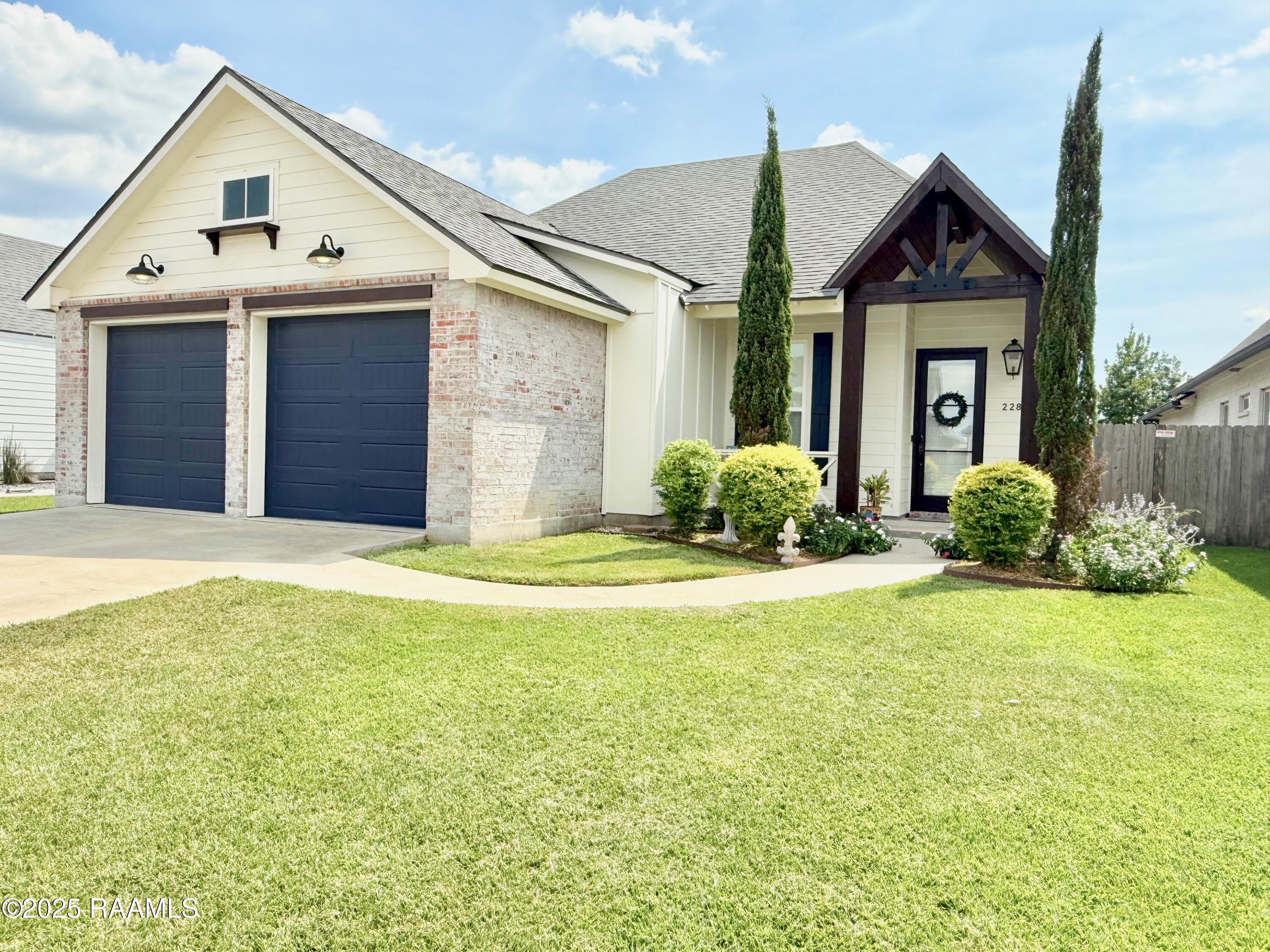 228 Whispering Meadows Road Broussard, LA 70518 - Photo 3 of 50 front