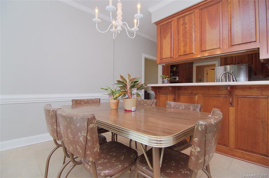 2210 McManus Road Midland, NC 28107 - Photo 14 of 24 a view of a dining room with furniture and chandelier