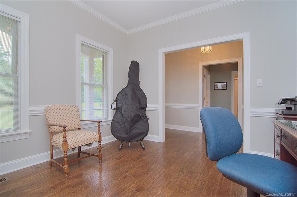 2210 McManus Road Midland, NC 28107 - Photo 22 of 24 a living room with furniture and a chair