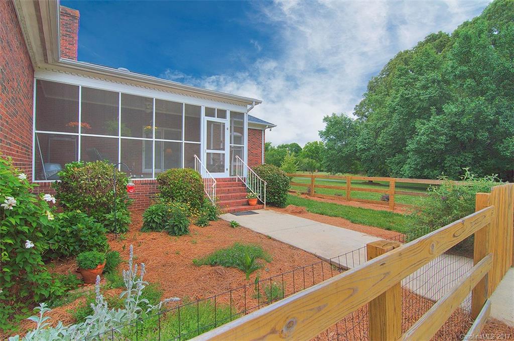 2210 McManus Road Midland, NC 28107 - Photo 4 of 24 a house view with a garden space