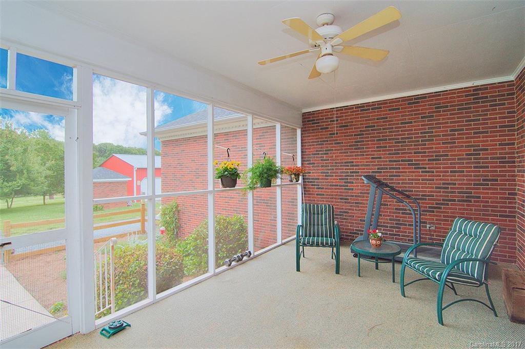 2210 McManus Road Midland, NC 28107 - Photo 5 of 24 a view of a two chairs in the balcony