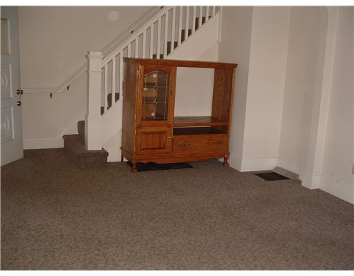 545 Walnut Street Vandergrift, PA 15690 - Photo 4 of 16 Living Room. Another view of the living room and includes this entertainment center for the new owners.