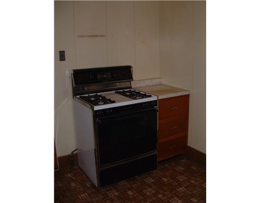 545 Walnut Street Vandergrift, PA 15690 - Photo 6 of 16 Kitchen. Gas stove and additional storage