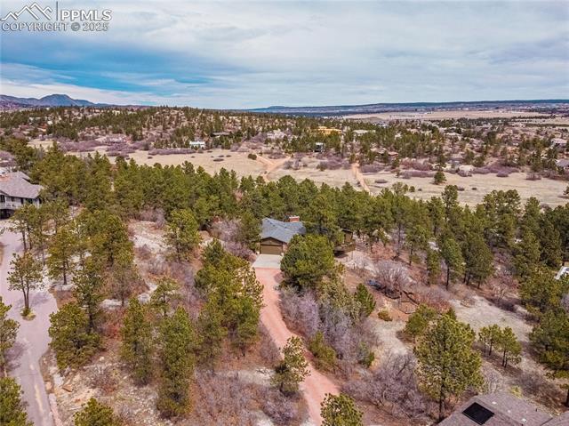 7175 Higher Ridges Court Colorado Springs, CO 80919 - Photo 48 of 50 Birds eye view of property with a mountain view