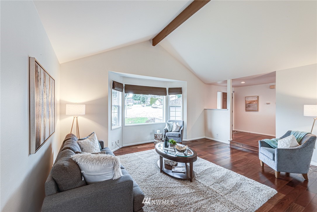 2025 Field Avenue Northeast Renton, WA 98059 - Photo 13 of 23 a living room with furniture and a window