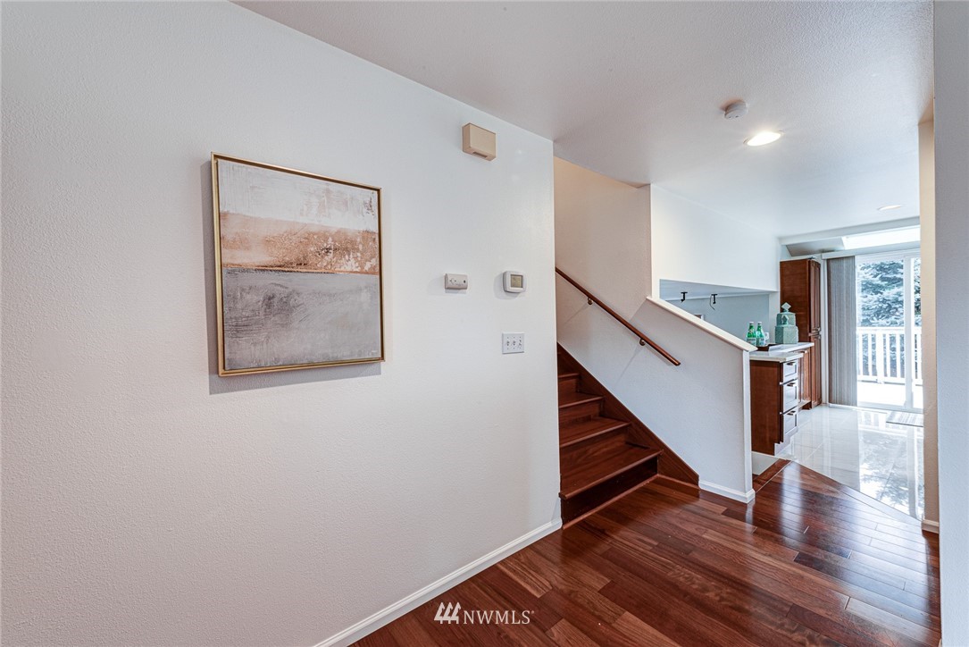2025 Field Avenue Northeast Renton, WA 98059 - Photo 3 of 23 a view of staircase with wooden floor and stairs