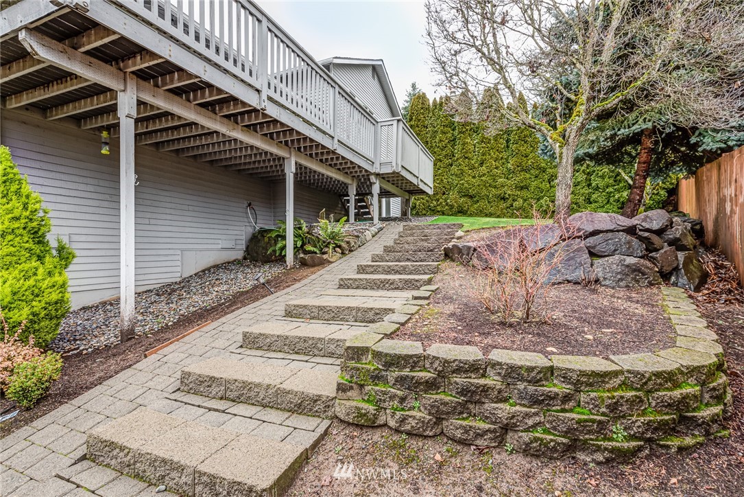 2025 Field Avenue Northeast Renton, WA 98059 - Photo 22 of 23 a pathway of a house with a yard