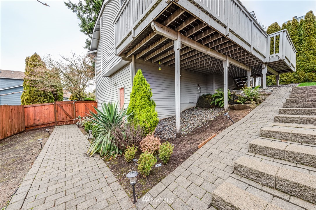 2025 Field Avenue Northeast Renton, WA 98059 - Photo 23 of 23 a front view of a house with garden
