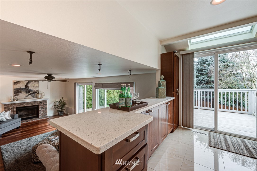 2025 Field Avenue Northeast Renton, WA 98059 - Photo 8 of 23 a kitchen with a stove a sink and a refrigerator